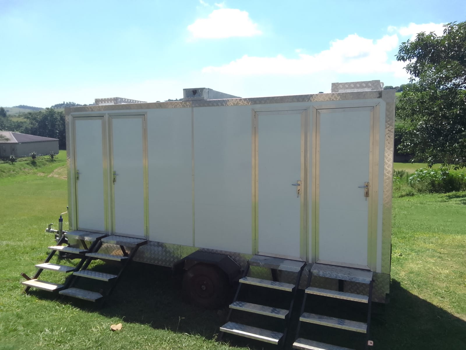 Nkhala project photo: multi-door vip toilet trailer