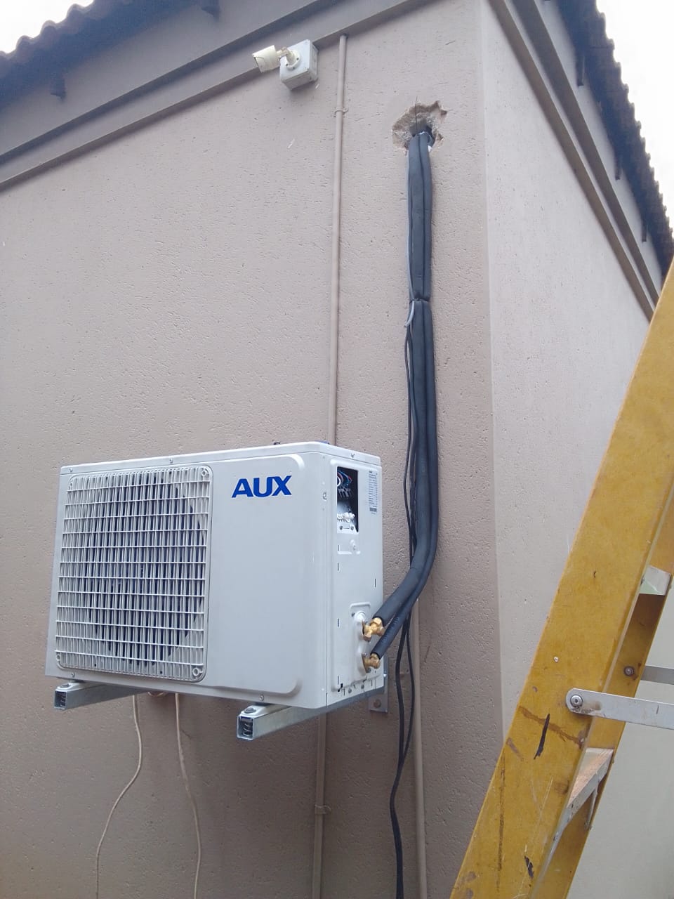 Nkhala project photo: air-conditioning unit installation